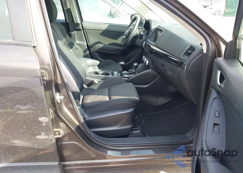 2016 Mazda Cx-5 Sport z USA, uszkodzony, nr VIN JM3KE2BYXG0716835